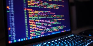 Python code on a glowing computer screen.